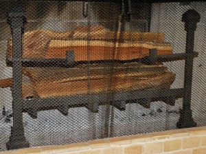 The Texas Fireframe grate holds two levels of cedar logs all summer long.